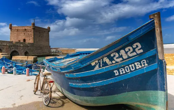 stock image Essaouira, Morocco - 26 March, 2024: typical blue fishing boat in the harbour of Essaouira