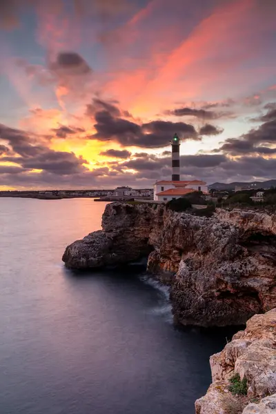 stock image A view of the Portocolom Lighthouse in eastern Mallorca at sunset