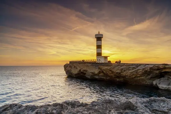 stock image A view of the lighthouse at Colonia Sant Jordi in Mallorca at sunset