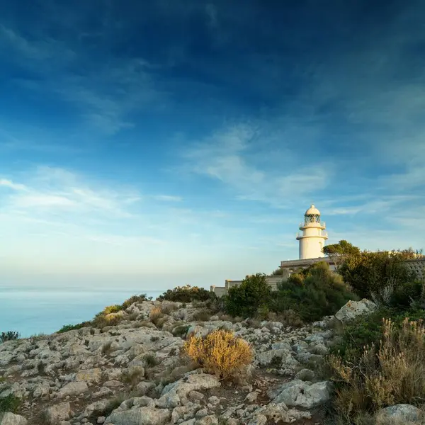 stock image A view of the Cap de Sant Antoni Lighthouse in Alicante Province in warm evening light