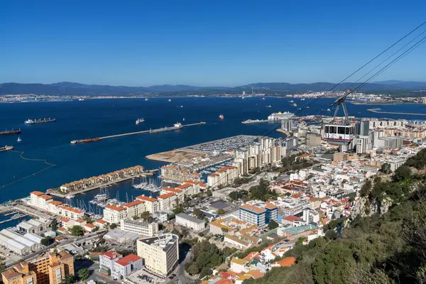 stock image Gibraltar, Gibraltar - 27 April, 2024: view of the Bay of Algeciras and downtown Gibraltar with the cable car in the foreground