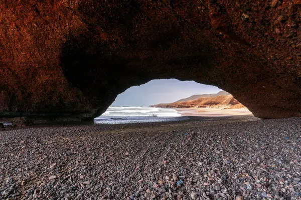 stock image A view of the beach and rock arch at Legzira on the Atlantic Coast of Morocco