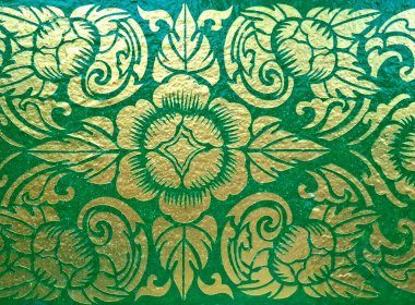 Klasik Tayland yeşili döşeme. Zengin yeşil renkli ve altın aksanlı geleneksel Tayland tasarımlarını içeriyor..