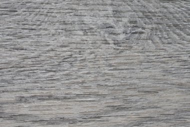 Ahşabın organik güzelliğini vurgulayan doğal tahıl ve dokularla karışık ahşap desenleri gösteren ayrıntılı bir arkaplan fotoğrafı..