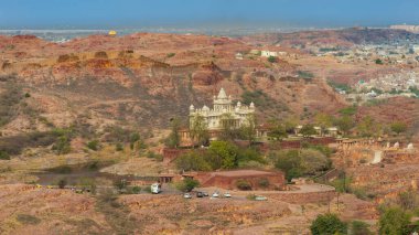 Jaswant Thada, located in Jodhpur, is a beautiful marble cenotaph built in 1899 in memory of Maharaja Jaswant Singh II. It features intricate carvings and serene surroundings. clipart