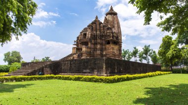 Vamana temple temple of the sacred heart of the city of the ancient landmark..Khajuraho is a town in the Chhatarpur district of Madhya Pradesh, India, renowned for its magnificent group of Hindu and Jain temples,is a UNESCO world heritage site. clipart