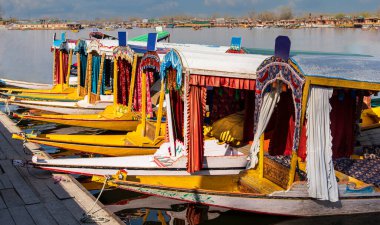 The Shikara is a traditional wooden boat found on Dal Lake in Srinagar, Kashmir. These graceful boats are an iconic symbol of the region clipart