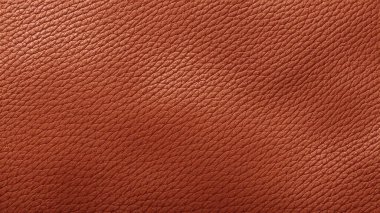 Warm brown leather with a subtle grain pattern and soft surface, offering a rich and refined look for use in product packaging, design, and decorative backgrounds. clipart