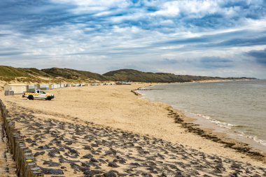 sandy beach on the north sea, Zoutelande in the Zeeland Riviera, Netherlands clipart