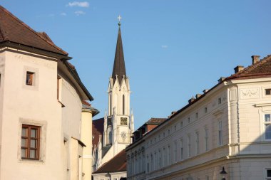 Maria-Himmelfahrt-Kirche church clock tower in Melk, Austria clipart