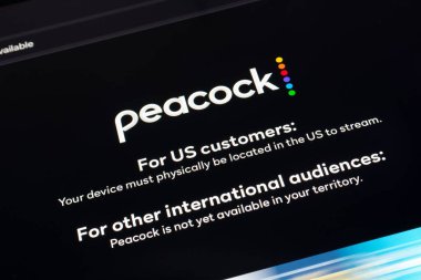 OSTRAVA, CZECHIA - SEPTEMBER 28, 2024: Warning message of Peacock streaming app which is not available due to geoblocking clipart