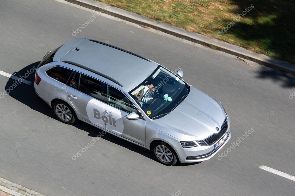 OSTRAVA, CZECH REPUBLIC - AUGUST 6, 2024: Facelifted silver Skoda Octavia Combi vehicle of Bolt taxi company with motion blur effect