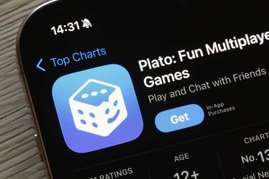 OSTRAVA, CZECHIA - NOVEMBER 23, 2024: App store with Plato Fun Multiplayer Games mobile app to be installed clipart