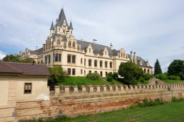 Landscape of Grafenneg Castle in Austria with dry moat clipart