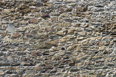 Duvardaki taş ve tuğlaların soyut dokusu