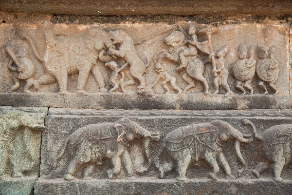 stock image Medieval stone wall carvings from ancient architecture ruins at the royal enclosure at Hampi