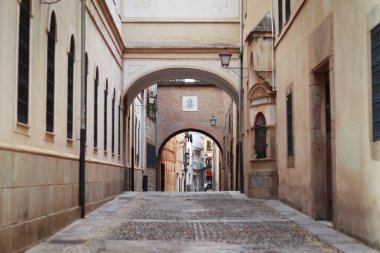 Tradition street with arcs in European old town