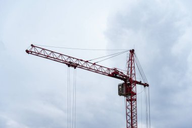 Construction crane close-up, view above the level of the crane cabin clipart