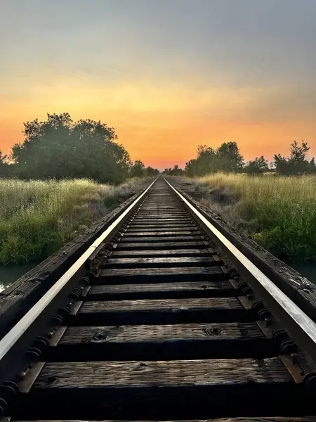Smokey Summer Sunrise and Train Tracks in PNW