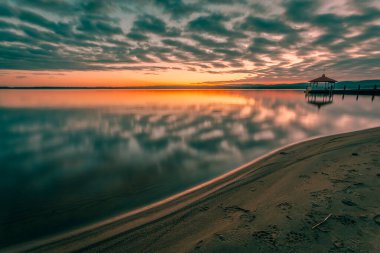 Summer night sunset view from Sotkamo, Finland. clipart