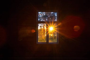 Old vintage ancient window and mystical sun rays light. clipart