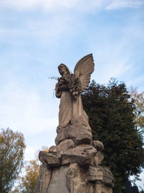 Angel Statue on All Saints' Day in Autumn clipart