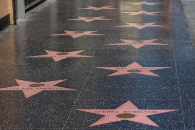 Los Angeles, USA - August 29, 2025:  A captivating photograph of the iconic stars on the Hollywood Walk of Fame in Los Angeles, showcasing the famous terrazzo and brass plaques set 