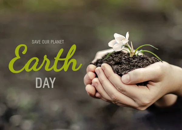 Text Our Planet Earth Day Child Hands Hold White Flower — Stock Photo, Image