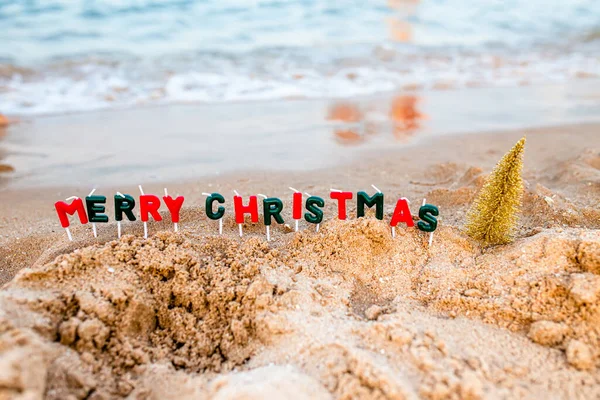 Seashore Rolling Wave Decorated Christmas Text Merry Christmas Candlesticks — Stock Photo, Image