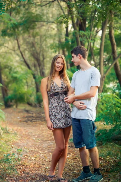 Guy Looks His Beloved Laughing Girl Caring Young Man Holding — Stock Photo, Image