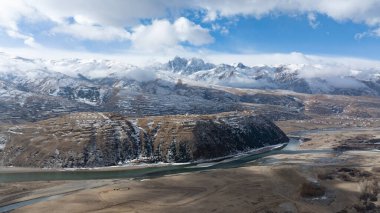 River and Mountain Scenery in Ganzi County, Western Sichuan clipart