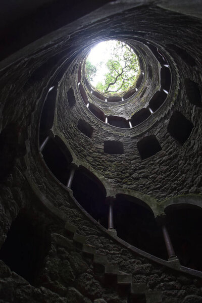 the ruins of the old city of the most famous landmark in the world. The big garden  the Quinta regaleira in Sintra, Portugal. 