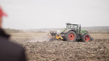 Fendt 1050 Vario doing deep ripping with Moro Aratri subsoiler on Oct 12, 2021 in Moldova. Illustrative Editorial content. Tractor Fendt 1050 Vario works with  Moro Aratri Fertibox subsoiler clipart