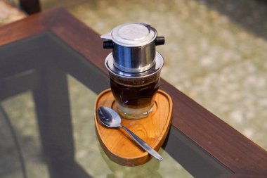 Purwokerto City, Central Java, Endonezya 'da Endonezya kahvesinin güzel tadı. 20 Kasım 2024 'te bir profesyonel tarafından çekilmiş. Endonezya kültürüyle güzel bir kahve.