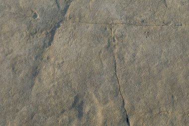 Kırık çizgileri olan soyut şekiller, kalıplar ve kireçtaşı yüzeylerinin dokusu. Kireç taşı, koyu beyaz renkte. Soyut çizgiler şeklinde çatlaklar. Grafik tasarımı veya afiş arkaplanı için