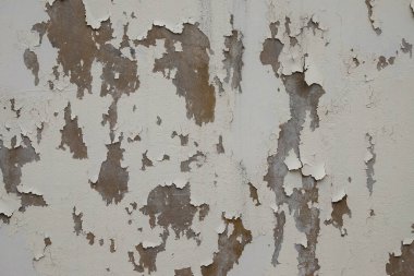 Soyut şekiller, desenler ve soyulmuş beyaz duvarların dokuları. Grunge 'a bak ve eski duvarlar izlenimi ver. Grafik tasarımı için doğal desen ve doku arkaplanı