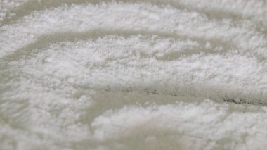 Soyut şekiller, desenler ve beyaz glutinöz pirinç unu dokuları. Yumuşak beyaz toz. Yiyecek ve içecek konsepti. grafik tasarımı için