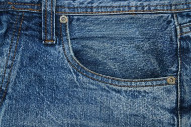 Kot pantolonun ön cebini kapat. Erkek giyim tarzı konsept. Grafik tasarımı ve afiş arkaplanı için güzel dikişler.