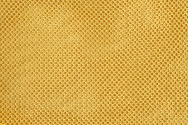 Sarı örgü soyut desen ve doku arkaplanı. Kadın çantalarındaki ağ aksesuarları. Grafik tasarımı veya afiş arkaplanı için