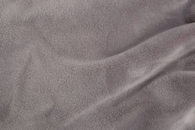 Mor kadife kumaş deseni ve doku arkaplanı. Kumaşın kıvrımları ve kıvrımları. Doğal kumaş deseni ve doku. Grafik tasarımı için, 3 boyutlu biçimlendirme veya pankart arkaplanı