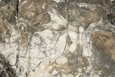 Kireçtaşı yüzeyinin soyut desen ve doku arkaplanı. Grafik tasarımı için, 3 boyutlu biçimlendirme veya pankart arkaplanı