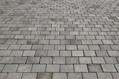 Yol şablonu ve doku arka planı kaldırım taşlarını kullanıyor. Gri çimentodan yapılmış taş bloklar. Sanayi konsepti. Grafik tasarımı için, 3B görüntüleme ve pankart arkaplanı