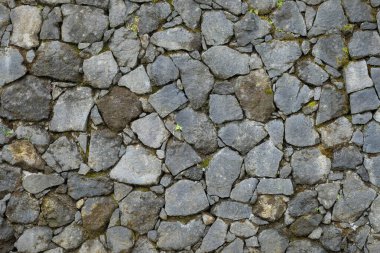 Doğal taştan yapılmış arkaplan duvarı. Dış ve mimari tasarım kavramı. Metin için alanı kopyala. Grafik tasarımı, 3D görüntüleme ve afiş arkaplanı