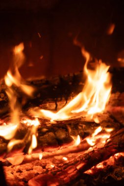 photos of fire in the fireplace bright flames smoldering coals clipart