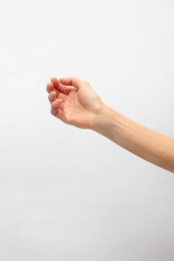 İnce bir kol ve elin parlak bir arka plan yakın çekim fotoğraf makro görünümüne karşı yakın plan görüntüsü