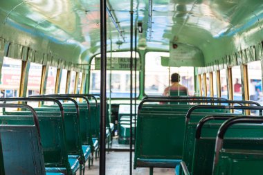 In a bus running through the city of Kollam, India clipart