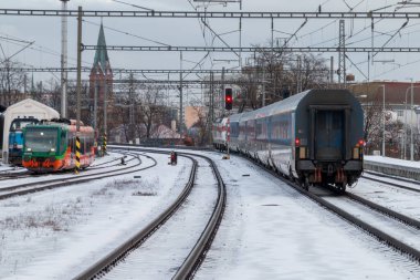 Teplice, Czech Republic, Jahuary 7, 2025. Local railway station. The tain leavesthe station. High quality photo clipart