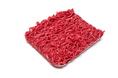 The raw minced beef meat detail.  Isolated in a white background.