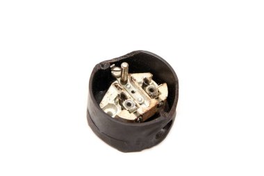 The old used wall socket from the old maschine isolated in a white background.