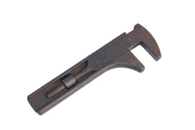 Paslı, ayarlanabilir İngiliz anahtarı kapağı beyaz arkaplanı izole etti